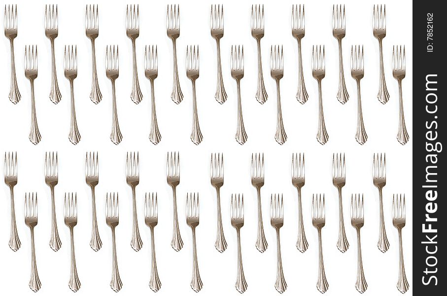 A repeatable background of forks on white. A repeatable background of forks on white.