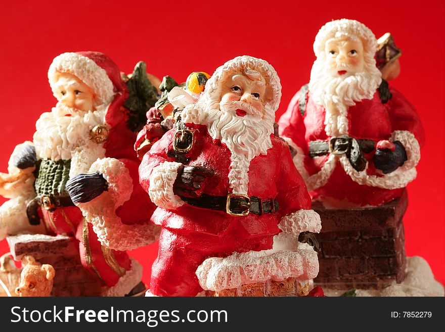 Three Santa Claus Figurines, Studio