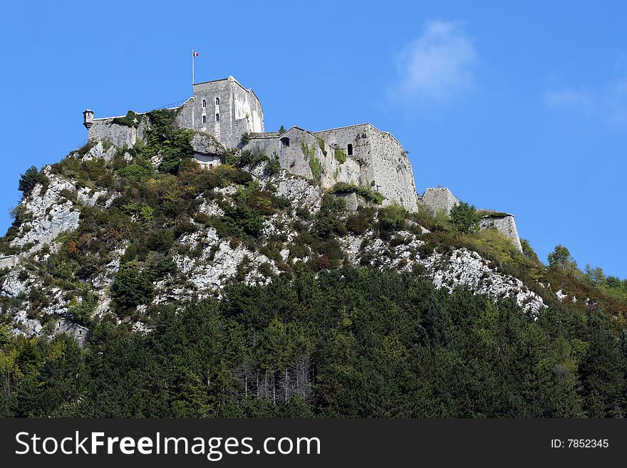 Fort Belin in France, near the town of Salins-les-Bains. It's on top of a cliff.