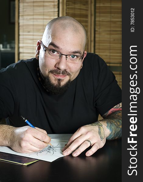 Tattooer Sketching For His Next Tattoo