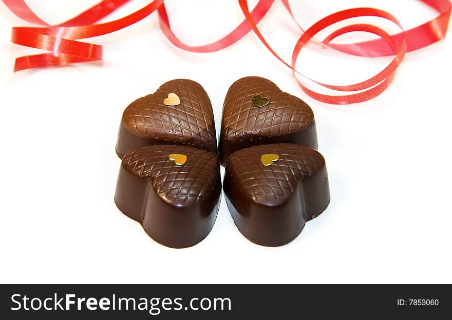 Heart Shaped Chocolates Isolated Over White