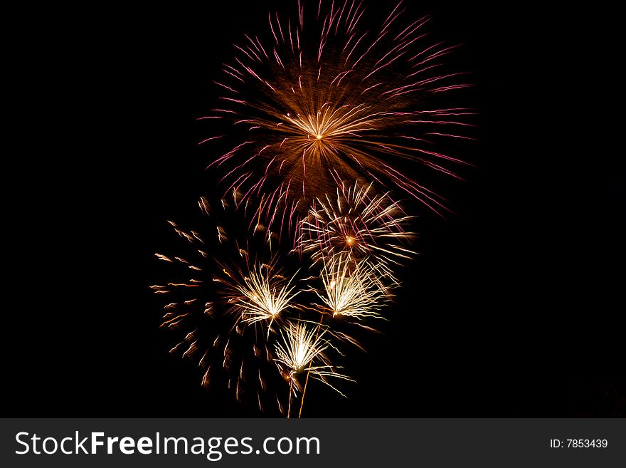 Bright colored fireworks on black background