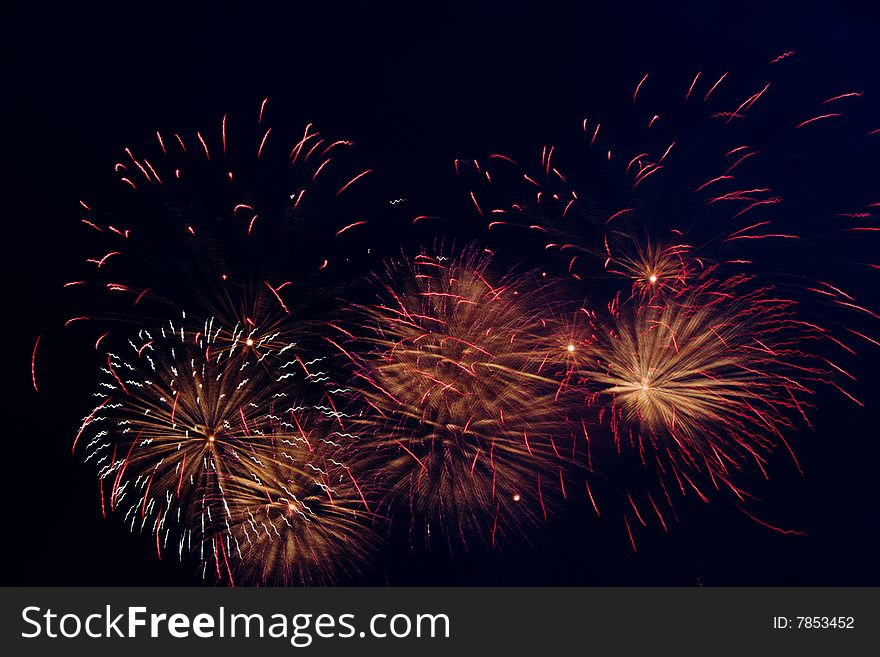 Bright colored fireworks on black background