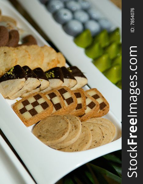 An image of assorted hand dipped tarts and cookies