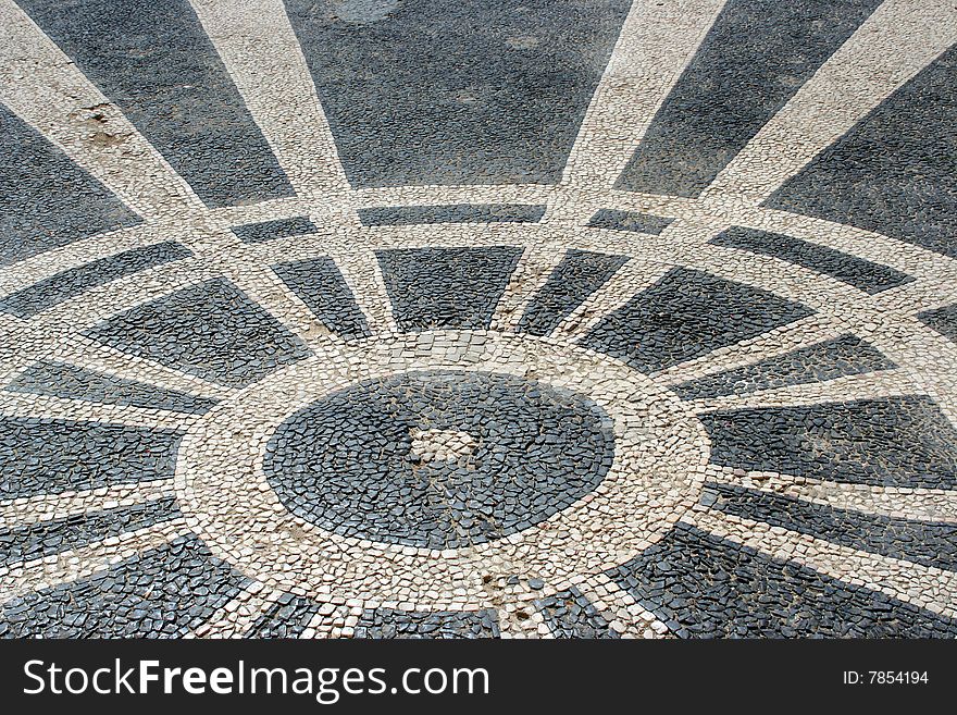 Black and white stones in lines and circle