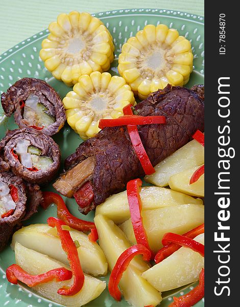 Beef steak with vegetable on plate