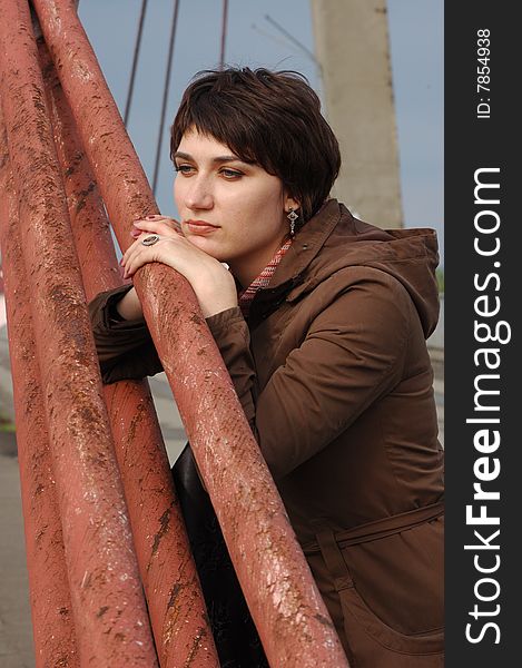 Pensive Woman On The Bridge
