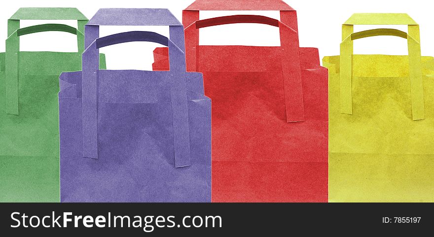 Shot of three coloured paper shopping bags on white. Shot of three coloured paper shopping bags on white