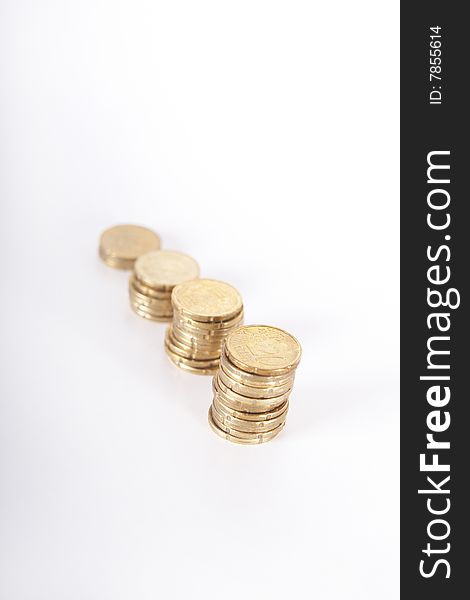 Stacked up coins. Isolated over white. Ideal Businesshot. Stacked up coins. Isolated over white. Ideal Businesshot.