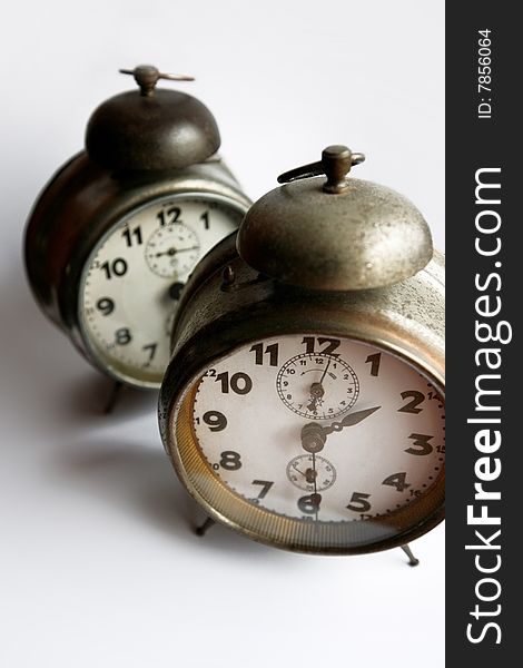 Old metal clocks with alarm bell. Old metal clocks with alarm bell.