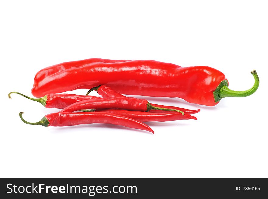 One big pepper near few small pepper. One big pepper near few small pepper