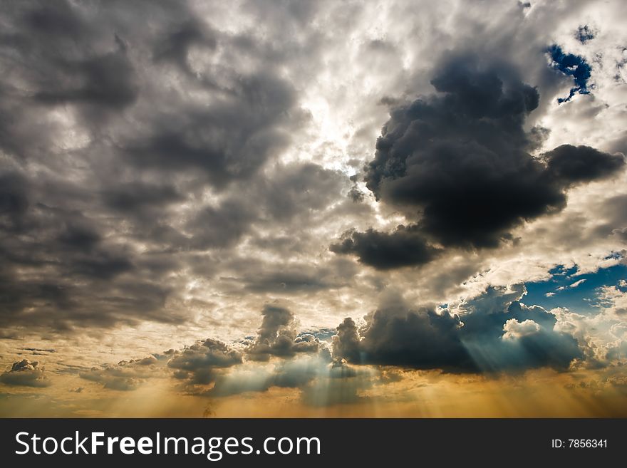 Cloudscape with sun ray shining through.