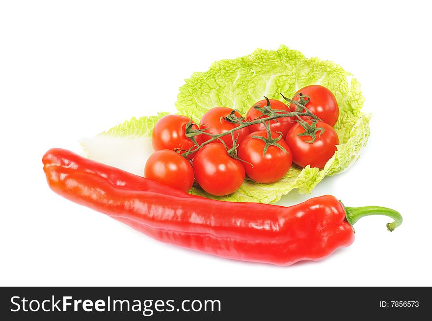 Big red pepper with tomatos on isolated background