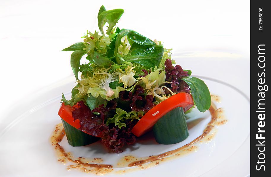 Vegetable salad on a white plate