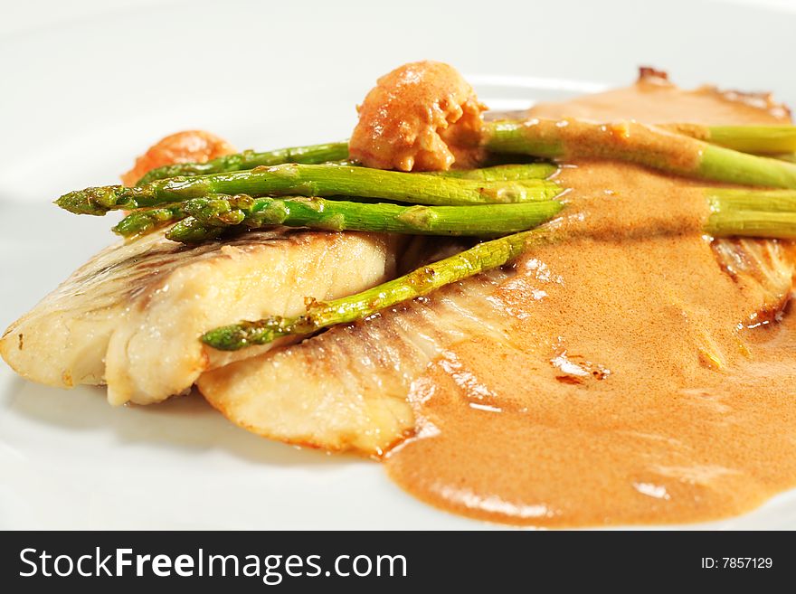 Sea Bass Fillet with Tomato Sauce and Fresh Asparagus