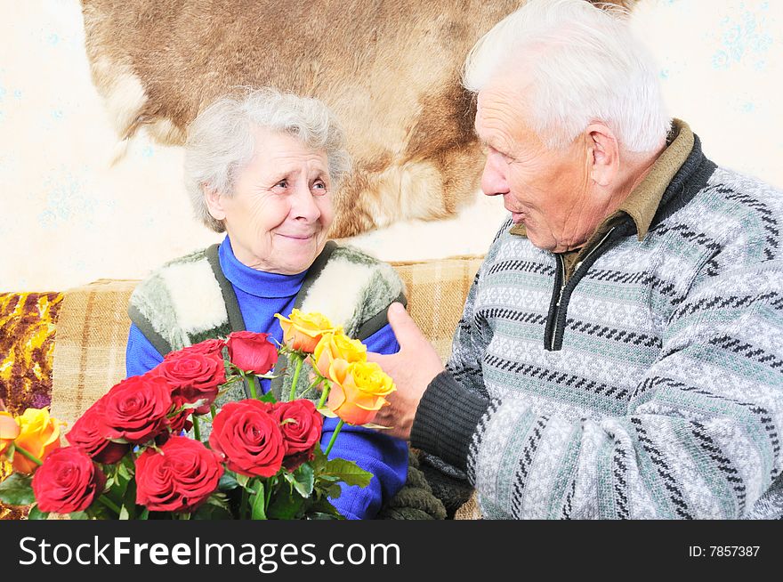 Elderly man sit near elderly woman. Elderly man sit near elderly woman