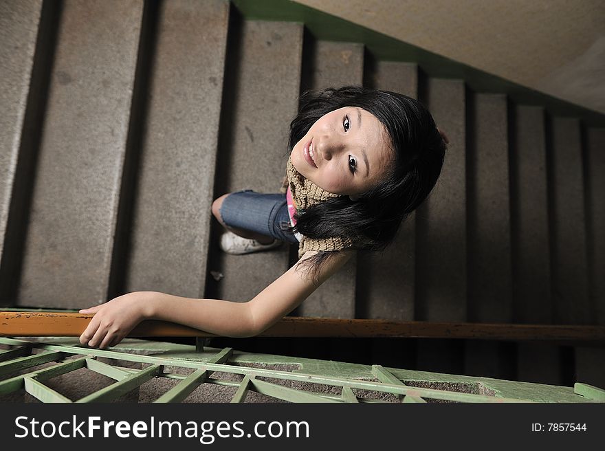 Black hair Asia teen age girl Walk in Staircase smile to you. Black hair Asia teen age girl Walk in Staircase smile to you