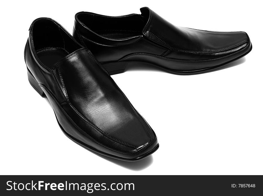 Black low shoes on a white background