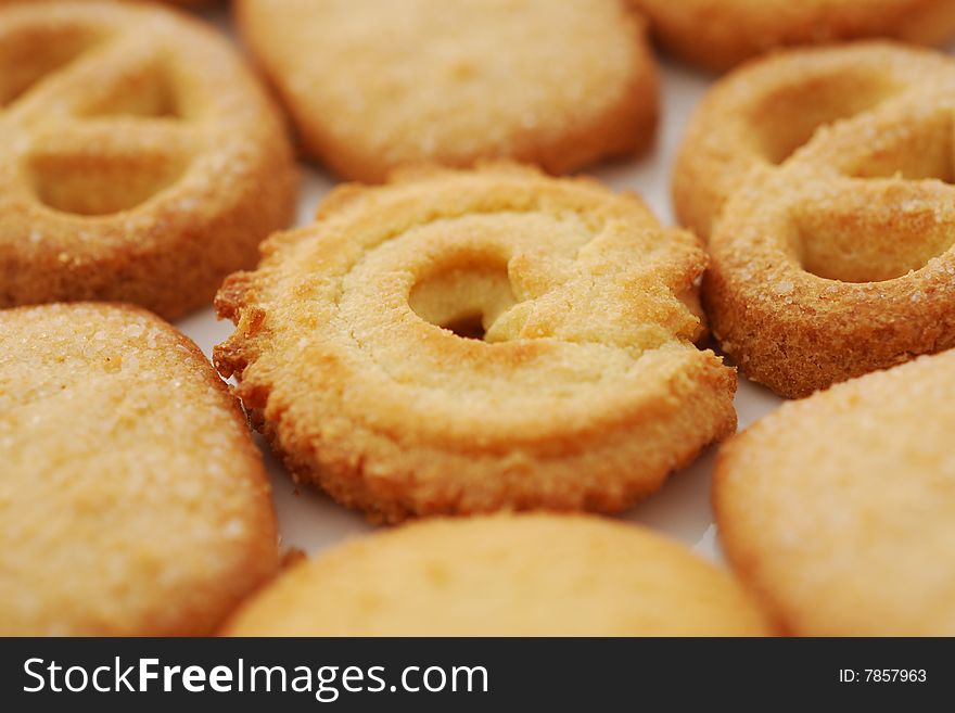 Close-up of cookies in a white plate.