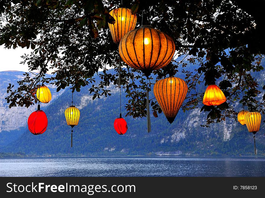 Chinese lantern-Not a few Fair lamp lamp ion in tree near to lake of Constance mountains