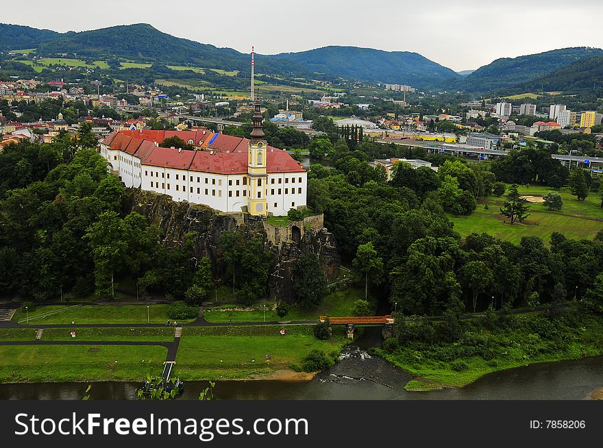Photograph of Decin Castle, the most popular attraction in Decin, a town in the north of the Czech Republic, just over the German border, about 80 minutes north-east of Prague (Capital of Czech Republic). It is situated on a hill near the town centre and is overlooking the Labe river. Originally it was built as a fort during the Seven Years’ War, later rebuilt to a Renaissance castle in 1673, 1788. restored to Baroque. Once the home of Bohemian kings, later functioned as the administrative centre of the Thuns. In a modern history it became a military garrison for German and Soviet troops. Since 1932 in the hands of Czechoslovak State (later Czech Republic). Photograph of Decin Castle, the most popular attraction in Decin, a town in the north of the Czech Republic, just over the German border, about 80 minutes north-east of Prague (Capital of Czech Republic). It is situated on a hill near the town centre and is overlooking the Labe river. Originally it was built as a fort during the Seven Years’ War, later rebuilt to a Renaissance castle in 1673, 1788. restored to Baroque. Once the home of Bohemian kings, later functioned as the administrative centre of the Thuns. In a modern history it became a military garrison for German and Soviet troops. Since 1932 in the hands of Czechoslovak State (later Czech Republic).
