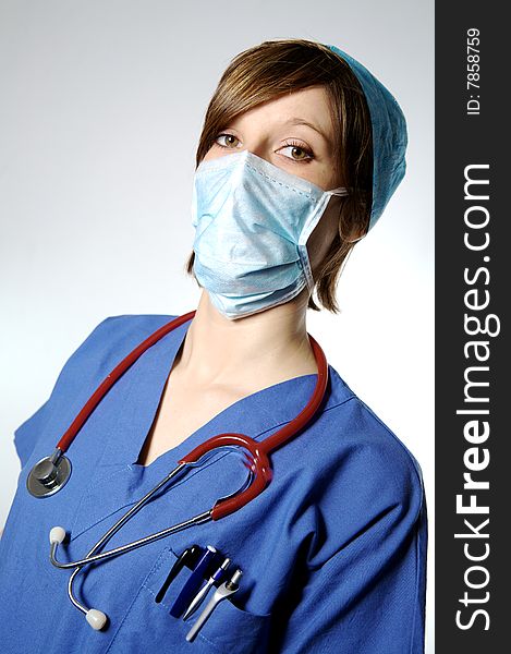 Nurse with mask and hat on a white blackground. Nurse with mask and hat on a white blackground