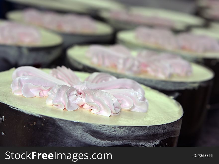 Pastry getting ready in stainless steel pans