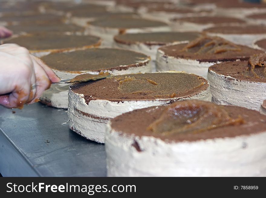 Sweet cakes with chocolate topping in the confectionery