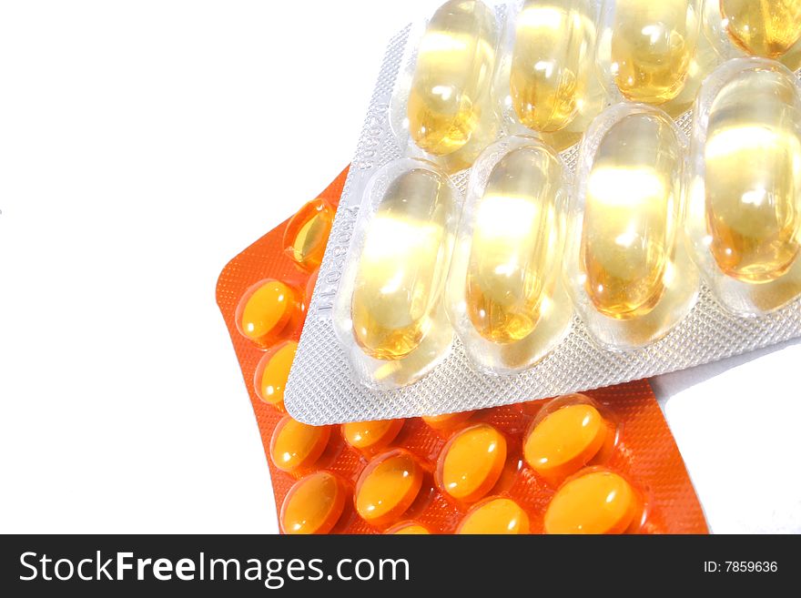 Some pills, capsules in package isolated on white. Bright, and clear.
