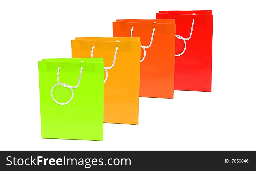 Shot of some coloured paper shopping bags on white. Shot of some coloured paper shopping bags on white