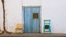 Two Old Chairs And A Door Stock Photos Two Old Chairs And A Door Stock Photos