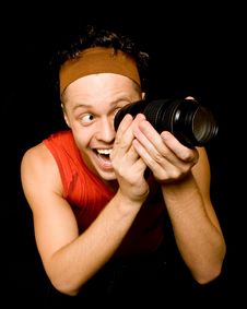 Young Man Looks Through Camera Lens Stock Images Young Man Looks Through Camera Lens Stock Images