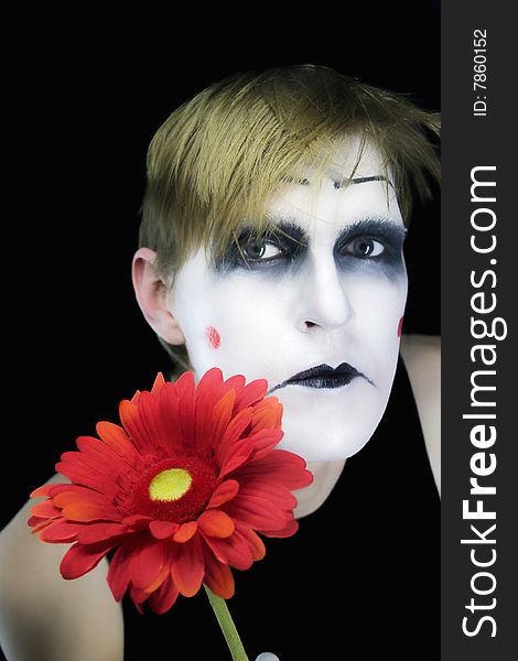 Gloomy mime with  red flower
