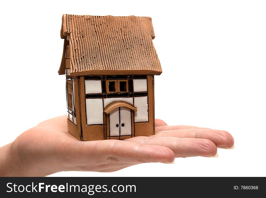 House in hand on a white background