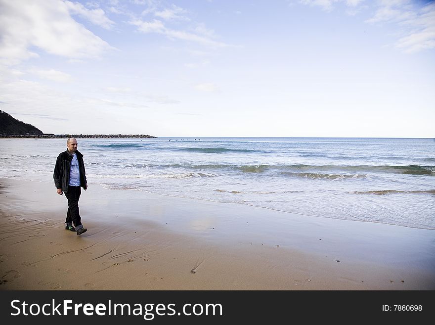 Man On The Beach. San Sebastian. Spain