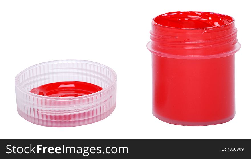 The red paint in a container with a lid