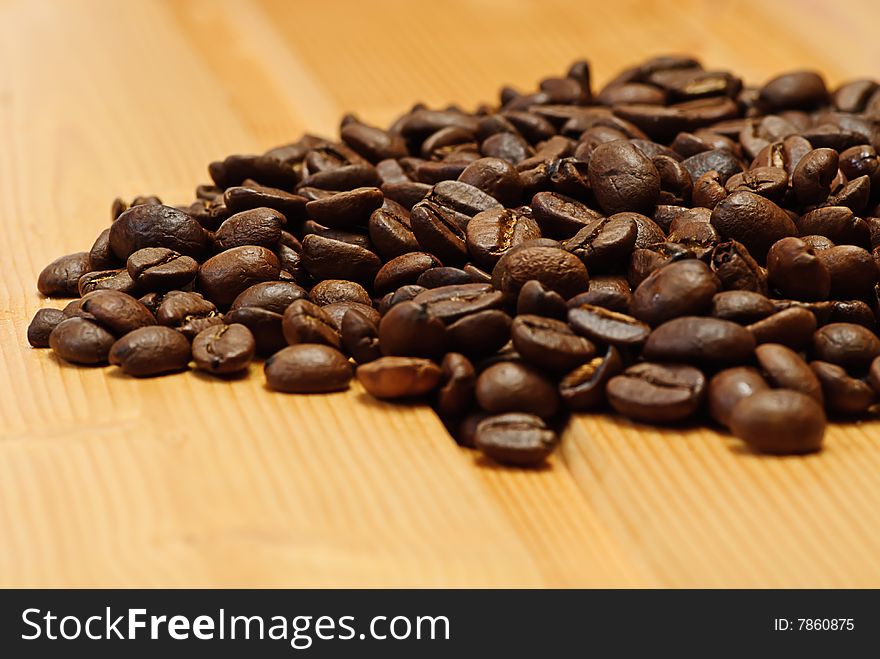 Beans coffee on wooden table. Beans coffee on wooden table