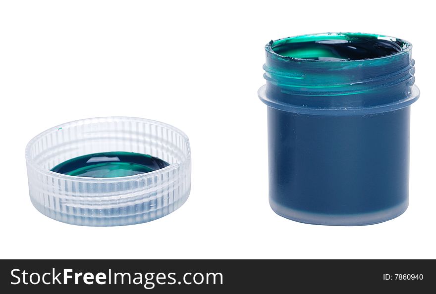 The green paint in a container with a lid