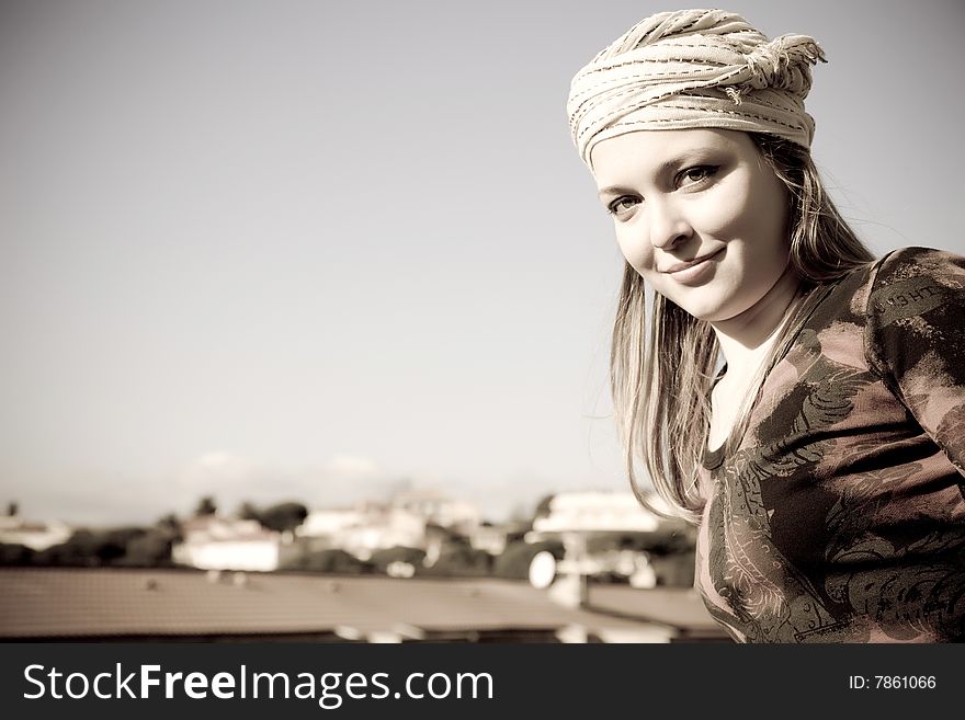 Smiling Woman Under The City Roofs. Europe Travel Series.