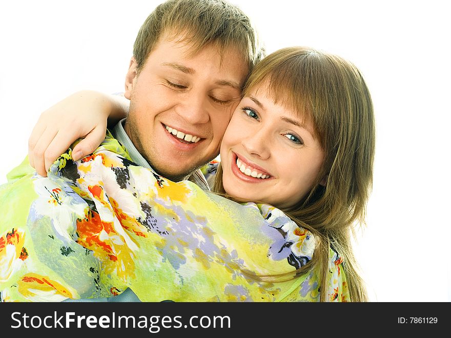 Happy young couple isolated against white background