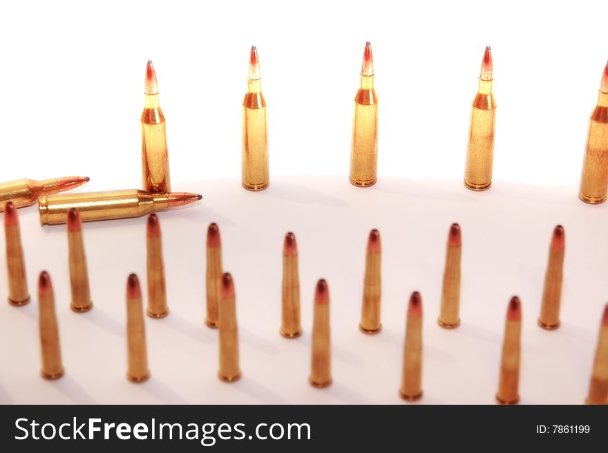 Ammunition all in rows on a mixed background. Ammunition all in rows on a mixed background