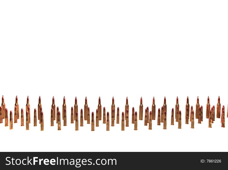 Ammunition all in rows on a white background with copyspace. Ammunition all in rows on a white background with copyspace