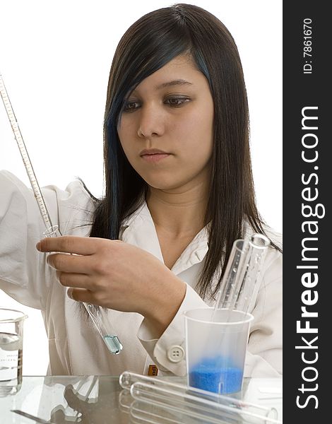 Female student at the education in chemistry, experiments in the laboratory