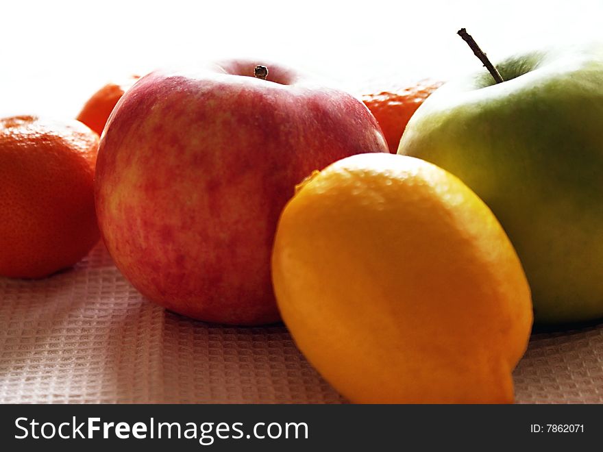Various fruit:apple,lemon and orange,natural lighting. Various fruit:apple,lemon and orange,natural lighting.