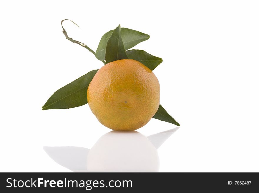 Fresh tangerine with leaves on white background