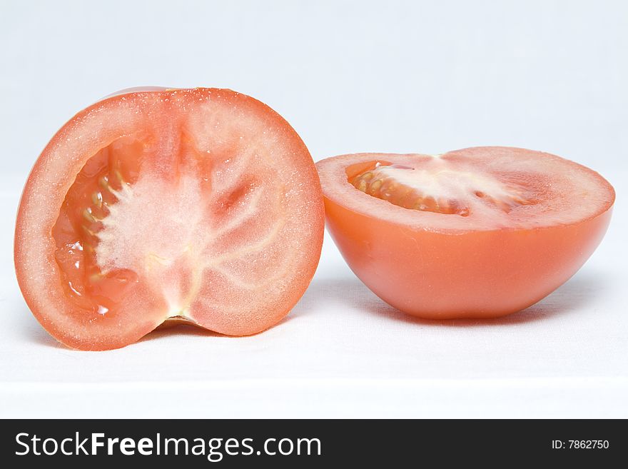 The tomato cut in the middle on two halves