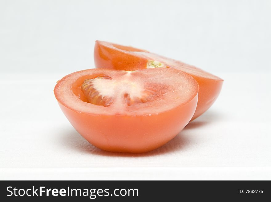 The tomato cut in the middle on two halves