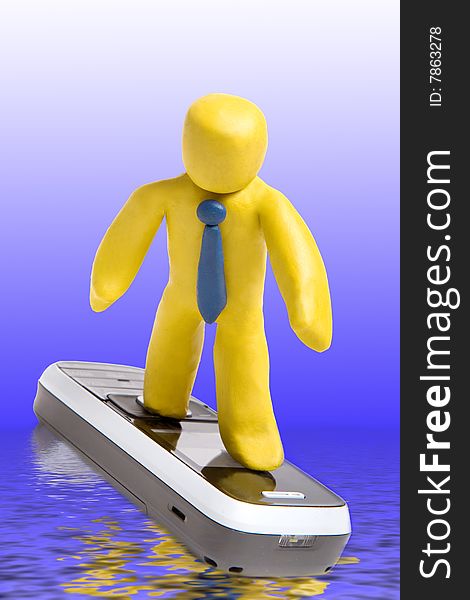 Plasticine man standing on mobile phone like surfer in blue water with reflections