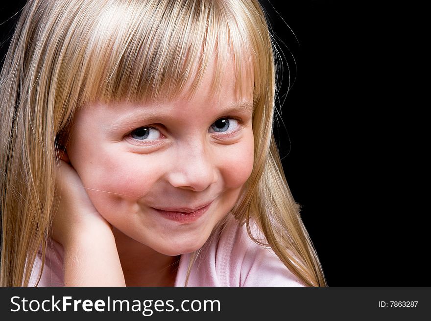 Blond Girl with big blue eyes on a black background