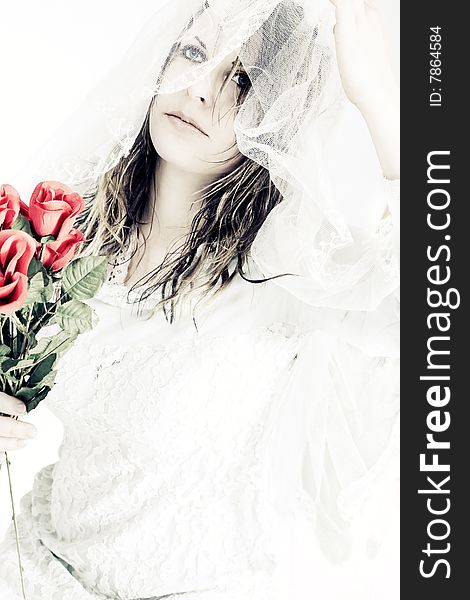 Depressed bride with roses on her wedding day. Depressed bride with roses on her wedding day